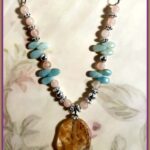 Glass Drop Pendant necklace. Elegant yet bold Pink Pendant Necklace with gem findings Glass Drop Elegant Pendant necklace. Elegant yet soft Pink and blue glass pearled with silver findings